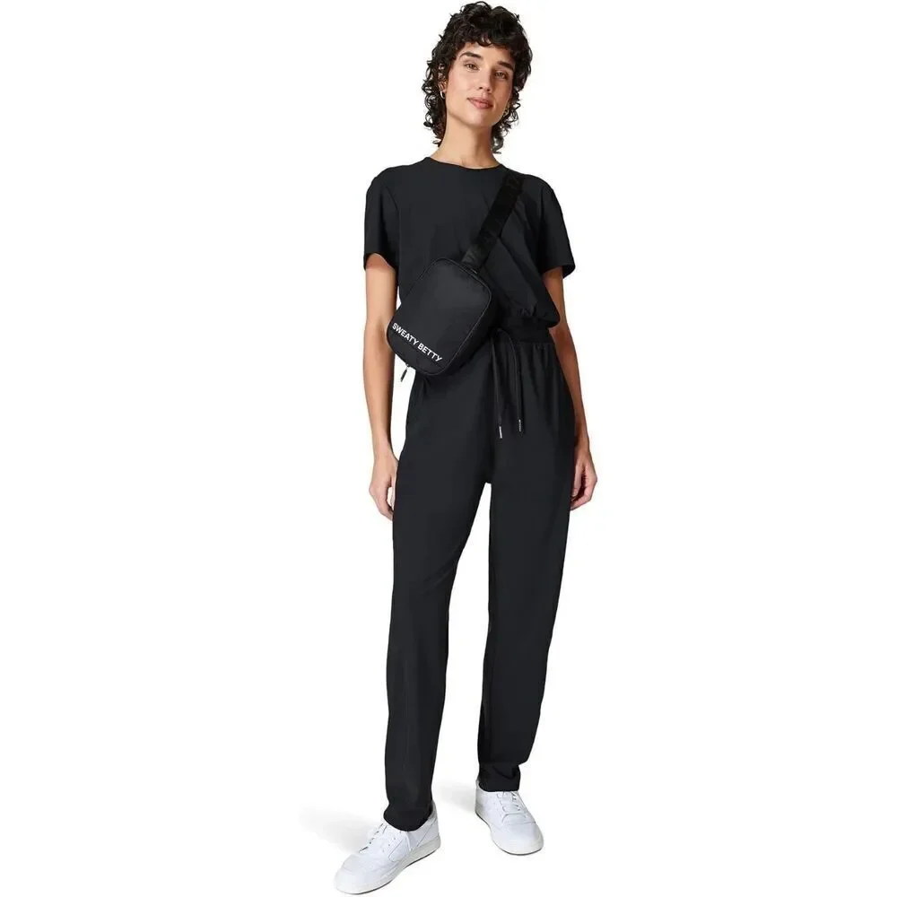 NWT's Sweaty Betty L71809 Womens Black Explorer Short Sleeve Jumpsuit 29” Sz L U